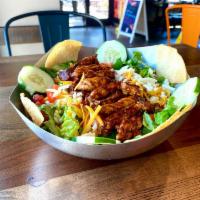 NEW! Southwestern Chicken Salad · Chipotle glazed grilled chicken on a bed of freshly chopped romaine lettuce, diced tomatoes,...