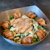 Chicken Caesar Salad · Freshly chopped romaine lettuce and grilled chicken breast drizzled with smoky Caesar dressi...