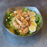 Cobb Salad · Grilled chicken on freshly chopped romaine lettuce with avocado slices, hard-boiled eggs, di...