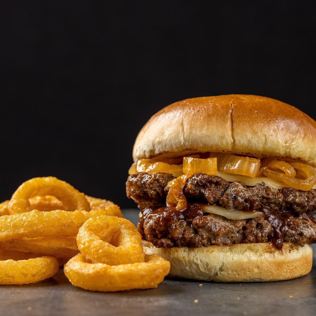 Steak Burger · Two seasoned quarter-pound Angus beef patties stacked with sauteed onions, zesty pickles, A.1. Sauce®, mayo and provolone cheese on a lightly toasted bun.