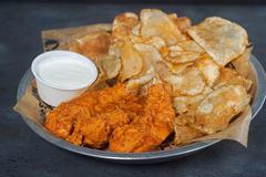 Buffalo Chicken Fingers Platter · Jumbo tenders grilled or hand-breaded and tossed in your choice of our national award-winnin...