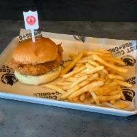 The Original Chicken Sandwich · A hand-breaded chicken breast topped with zesty pickles and garlic aioli on a lightly toaste...