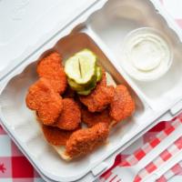 Nuggs® · 10 plant-based chicken nuggets served with our housemade vegan Ranch. Add sides a la carte t...