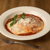 House Made Baked Lasagna (Family Style) · Layered with seasoned ricotta cheese and marinara, then smothered with marinara sauce and to...