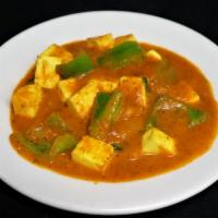 Karahi Paneer · Paneer cooked with cut onions, bell peppers and tomatoes.