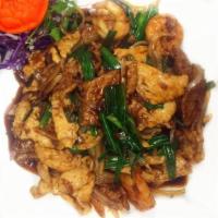 149. Mongolian Triple Delight · Chicken, beef and shrimp with green onion and white onion in Mongolian sauce. Served with ch...