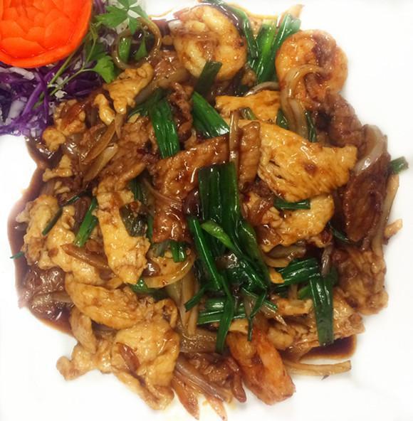 149. Mongolian Triple Delight · Chicken, beef and shrimp with green onion and white onion in Mongolian sauce. Served with choice of fried rice or white rice. Hot and spicy.