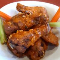 7 Spicy Wings · 7 pieces. Served with coleslaw, celery, carrots, ranch and spicy wing sauce.