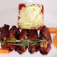 7 Afro Wings Starter · 7 pieces. Served with carrots, celery, sesame seeds, green onions, ranch and Afro wing sauce.