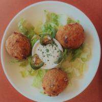 Jalapeño Poppers · Fried balls stufed with three cheese belnd, cream cheese and grilled Jalapeño served with in...