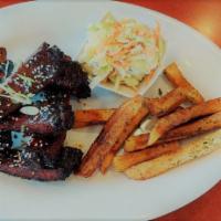 Chulla’s Afro Ribs · Glazed, grilled or slow-cooked pork ribs with coleslaw with Fries or Rice.