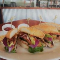 Chulla’s Steak Sandwich  · Served with pickles, bacon, lettuce, bacon, tomatoes, red onion, avocado, Swiss cheese and s...