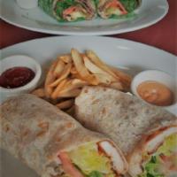 Chicken Shawarma  · Served with red onion, pickles, lettuce, tomato, avocado, Swiss cheese and signature sauce.