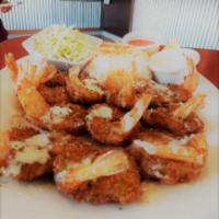 10 Coco Loco Shrimp · 10 pieces. Shrimp breaded with coastal spices, white rice and coleslaw with Guerrero lime an...