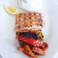 Grilled Salmon · Served with white rice, lemon wedge, garlic butter, roasted veggies or potatoes.