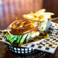 Cali Chick · Chicken breast grilled and topped with bacon, pepper Jack cheese, and avocado. Served on a t...