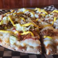 Cubano Pie · Swiss Alfredo base, Bourbon Smoked Ham, Pulled Pork, Dill Pickles, finished with Yellow Must...