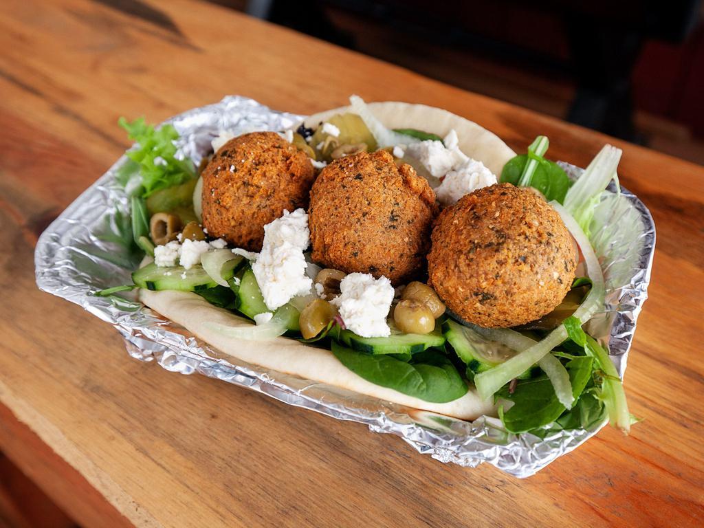 Falafel G · Moroccan spiced falafel served with home made tahini sauce. Vegetarian and vegan.