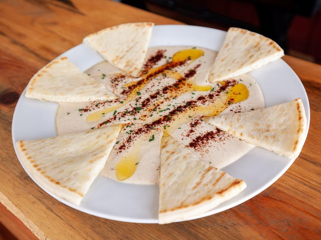 Side of Hummus · Served with 2 pita bread.