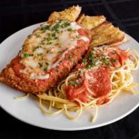 Chicken Parmigiana  · Our breaded chicken cutlet, specially seasoned and topped with marinara sauce and mozzarella...