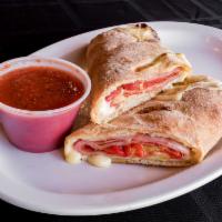 Lunchmeat Stromboli · Comes with ham, salami, capicola, American cheese and roasted peppers. Made without sauce in...