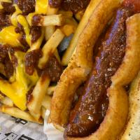 The Texas Rodeo Dog · Deep fried bacon wrapped 100% certified angus beef hot dog topped with factory chili, and on...