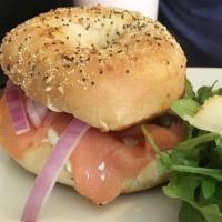 Smoked Salmon (Lox) Bagel Sandwich · Smoked salmon, capers, tomatoe, red onion, cream cheese. Served with arugula salad, cherry t...