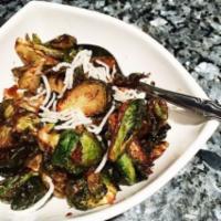 Soy Brussel Sprouts · Light blanched, teriyaki glaze and crispy rice noodle. 