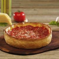 Stuffed Cheese Pizza · Our pan pizza stuffed with your favorite ingredients inside. Baked with a thin layer of doug...
