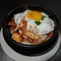 Kimchi Rice Pot    · Stir-fried kimchi, white onion over the choice of meat, served with steamed rice and a sunny...