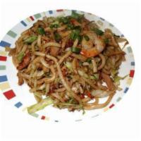 Stir Fried Udon Noodle  · Stir-fried udon noodles with scrambled eggs, cabbage, white onion, green onion and choice of...