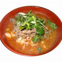 Spicy Sate Noodle Soup  · Noodle soup with house spicy sate sauce, bean sprouts, cucumber, onion, cilantro, and choice...