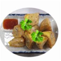 Fried Tofu Taro Shrimp Cake  · Deep-fried cake stuffed with tofu, taro, and shrimp served with sweet and sour sauce.