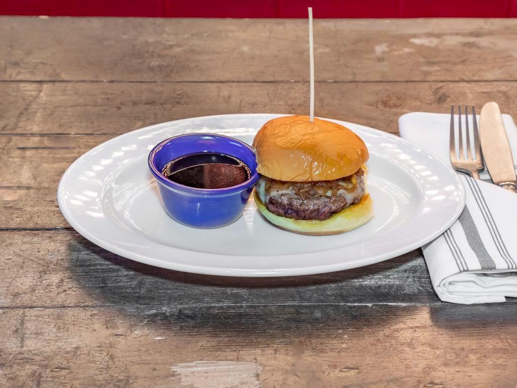 French Onion Burger  · This Devour Worthy Burger has, Creamy Horseradish, Melted Swiss, Caramelized Onions and Au Jus to Dip. It is Served on a Soft Potato Bun.   Our Proprietary Blend is all natural 100% certified Black Angus beef. (Not Pictured)
