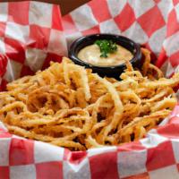 Onion Strings (Appetizer) · Lightly breaded and flash-fried. Served with remoulade sauce.