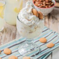 Down Home Banana Pudding · Rich and creamy banana pudding with slices of fresh bananas and vanilla wafers. Topped with ...