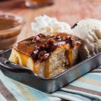 Dave's Award-Winning Bread Pudding · Scratch-made bread pudding and pecan praline sauce served warm with vanilla bean ice cream a...