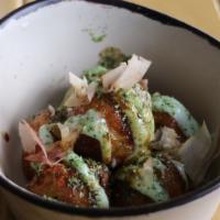 Classic Takoyaki · octopus dumplings, wasabi mayo, green nori, bonito flakes.