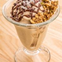 Ice Cream · 2 scoop of choice of vanilla, strawberry or chocolate ice cream, made with cashew, coconut, ...