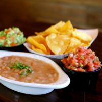 Chips and Frijoles · House made chips and beans
