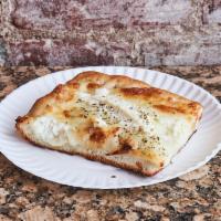 White Square Pizza · Fresh mozzarella, ricotta, drizzled honey, and extra virgin olive oil on a golden garlic cru...