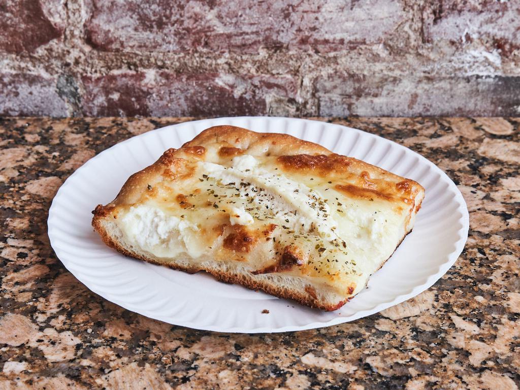 White Square Pizza · Fresh mozzarella, ricotta, drizzled honey, and extra virgin olive oil on a golden garlic crust.