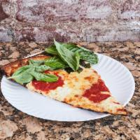 The Margherita Pizza · Fresh mozzarella, family recipe tomato sauce, fresh basil, and extra virgin olive oil.