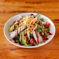 BBQ Chicken Tortilla Salad · Chopped chicken and shredded lettuce served with ranch dressing, corn and black bean salsa, ...