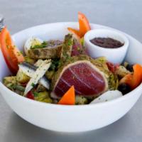 Nicoise Salad · Seared ahi tuna or salmon, olives, peppers, green beans, potatoes, eggs, tomatoes, artichoke...
