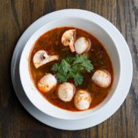 SP1 Tom Yum Soup · A savory spicy and sour soup seasoned with exotic Thai herbs, mushrooms, lemongrass, kaffir ...