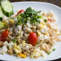 FR1. Crab Meat Fried Rice · Steamed jasmine rice, crab meat, egg, tomato, scallion, top with cilantro.