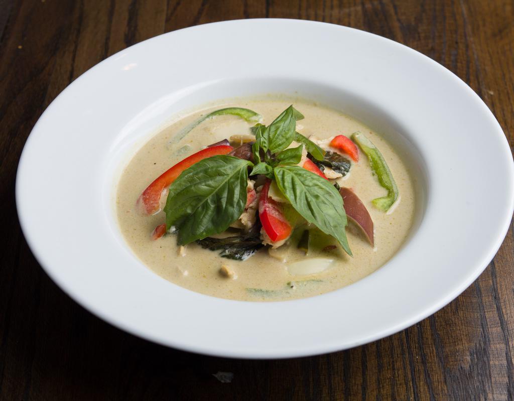 C2. Green Curry · Green curry paste, coconut milk, bamboo shoot, eggplant, bell pepper, fresh basil, and kaffir lime leaves. Served with rice.