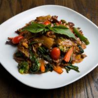 P3. Drunken Noodle · FLAT NOODLE  Pad kea mao stir-fried in spicy chili sauce with egg, onion, mix vegetables, to...