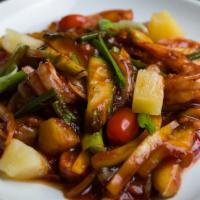 B4. Sweet and Sour · Sauteed with garlic, pineapple, tomatoes, cucumber, scallions, onions, and bell pepper in ho...